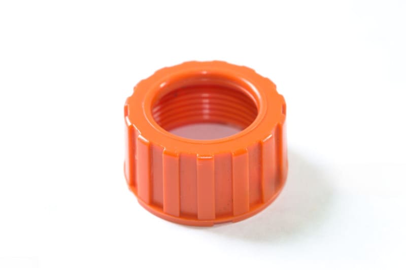 オレンジ色のプラスチック製ネジキャップ