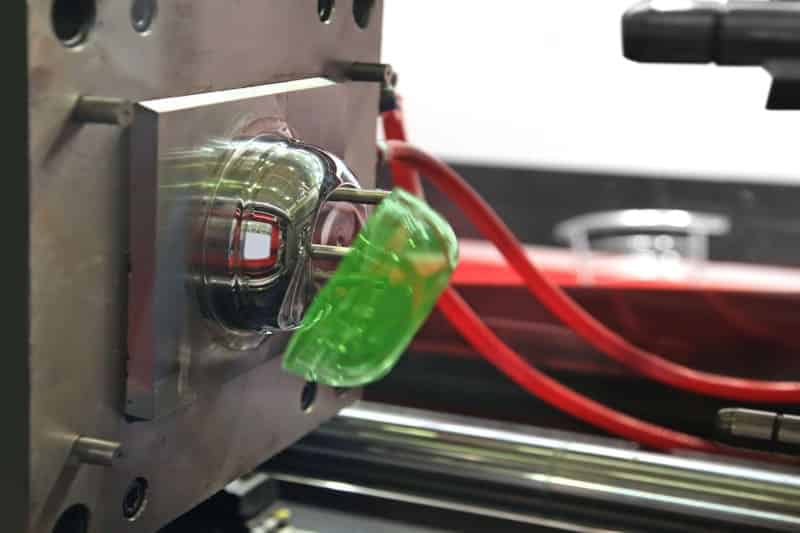 プラスチック射出成形金型の緑色のプラスチック部品