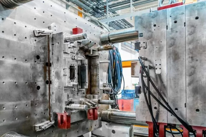Industrial injection mold setup in factory