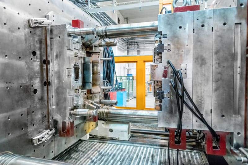 Large-scale injection mold in factory setting