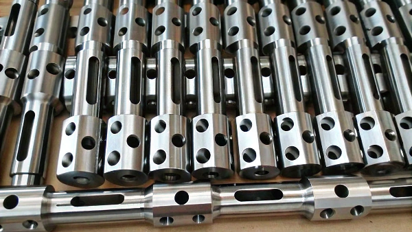 Stacked metal buffer components with precise CNC machining