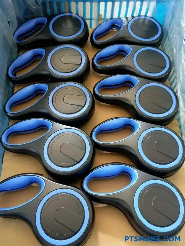 Blue and black injection molded plastic components
