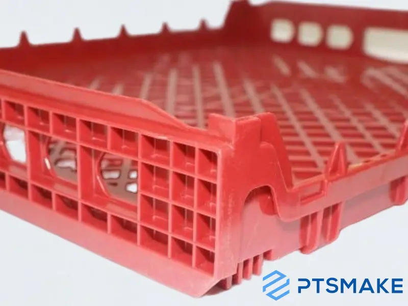 Close-up of a Red Plastic Tray with Grid Pattern