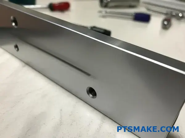Matte anodising surface on a sturdy aluminium component, showing electrochemical hardening layer