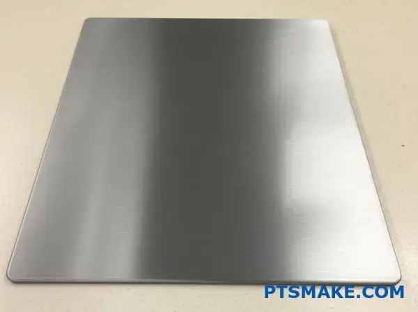Smooth anodised aluminum plate with uniform matte finish after surface etching treatment
