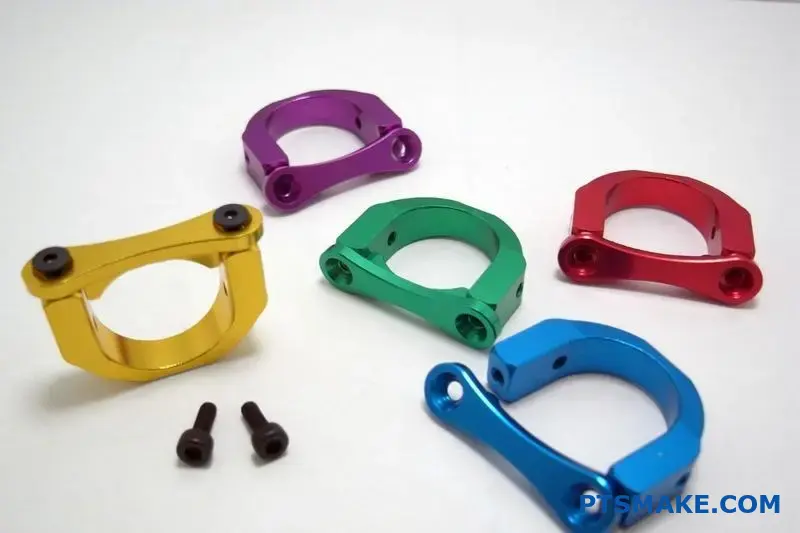 Anodized aluminium parts with different finishes and shapes showcasing anodising variations