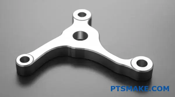 Präzisionsgefertigtes Titanbauteil mit abgerundeten Ecken und glatten Verrundungen für verbesserte CNC-Fertigungsmöglichkeiten und geringere Produktionskosten