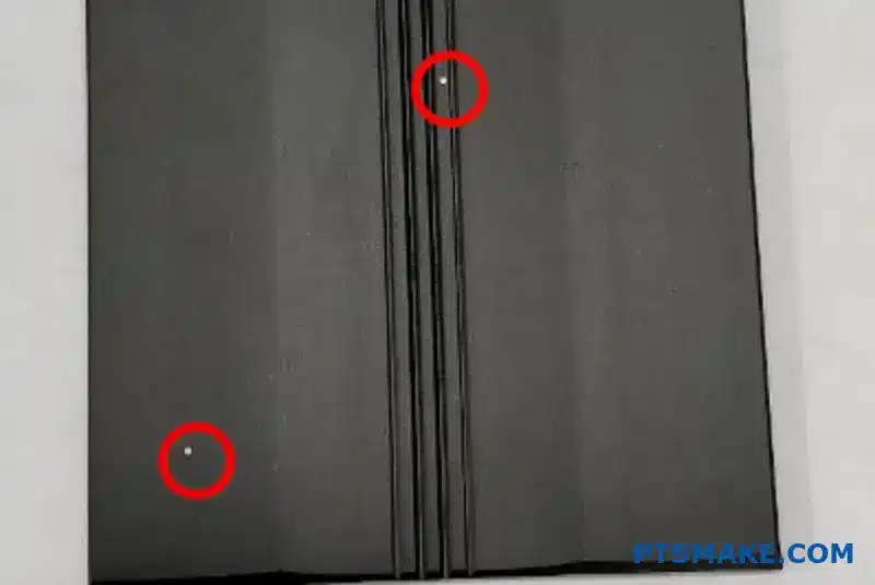 Blue anodized aluminum components showing surface defects and quality variations for troubleshooting analysis