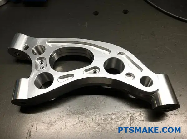 High-quality forged aluminum suspension part showcasing precision manufacturing and cost estimation factors for automotive applications