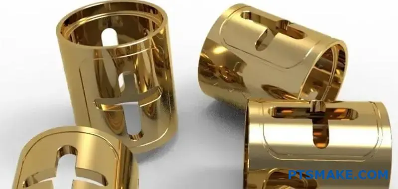 Four Gold CNC Machined Components with Cross Design